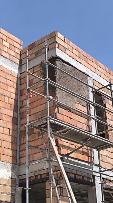 Fachada de ladrillo y enfoscado - Reformas Marian Zaragoza